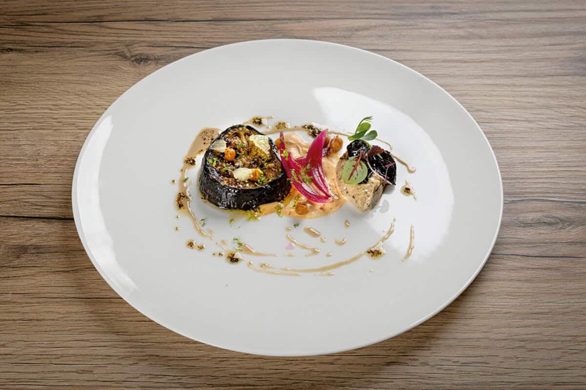 Rudolf Achenbach Preis 2025 Gewinnergericht Aubergine orientalisch, Trockenpflaume, Zwiebel und Crème fraîche